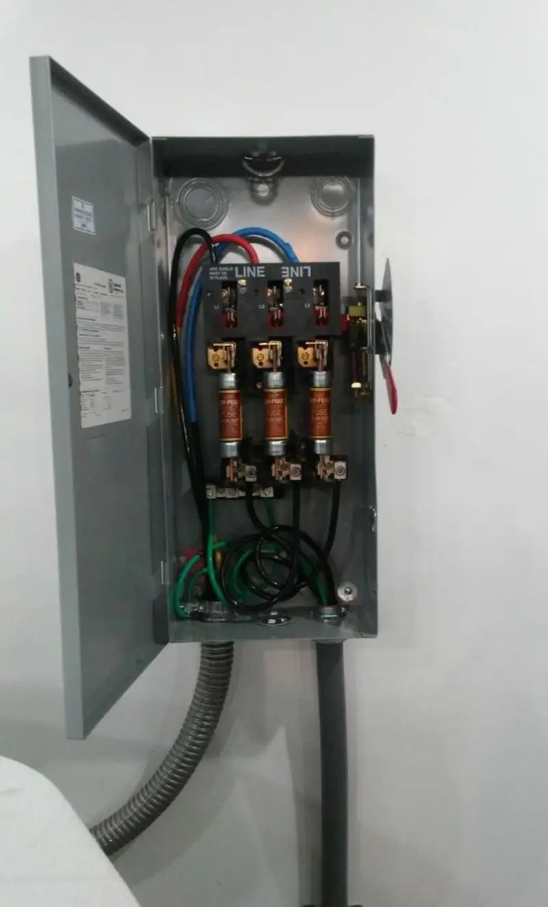 Three-phase disconnect switch installed for Smoke Detector Installation in Uxbridge